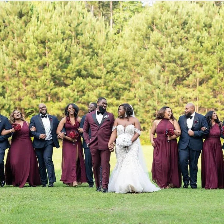 Burgundy Double-Breasted Groom Tuxedo with Black Peak Lapels