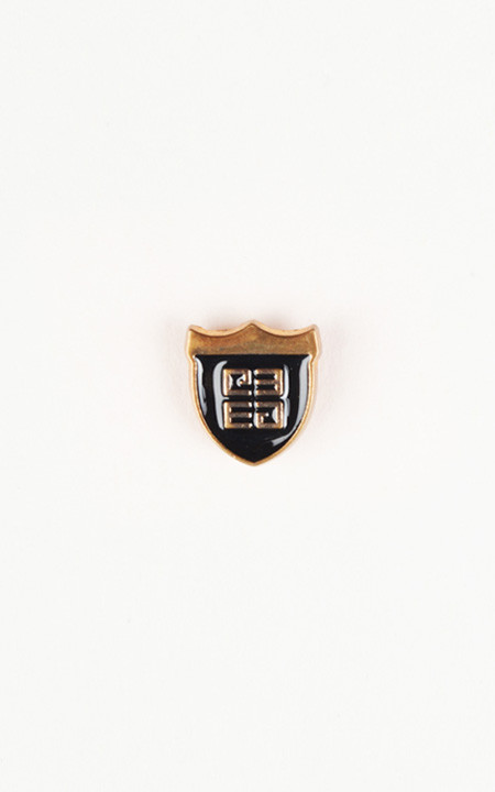 Crest Black And Gold-Tone Lapel Pin